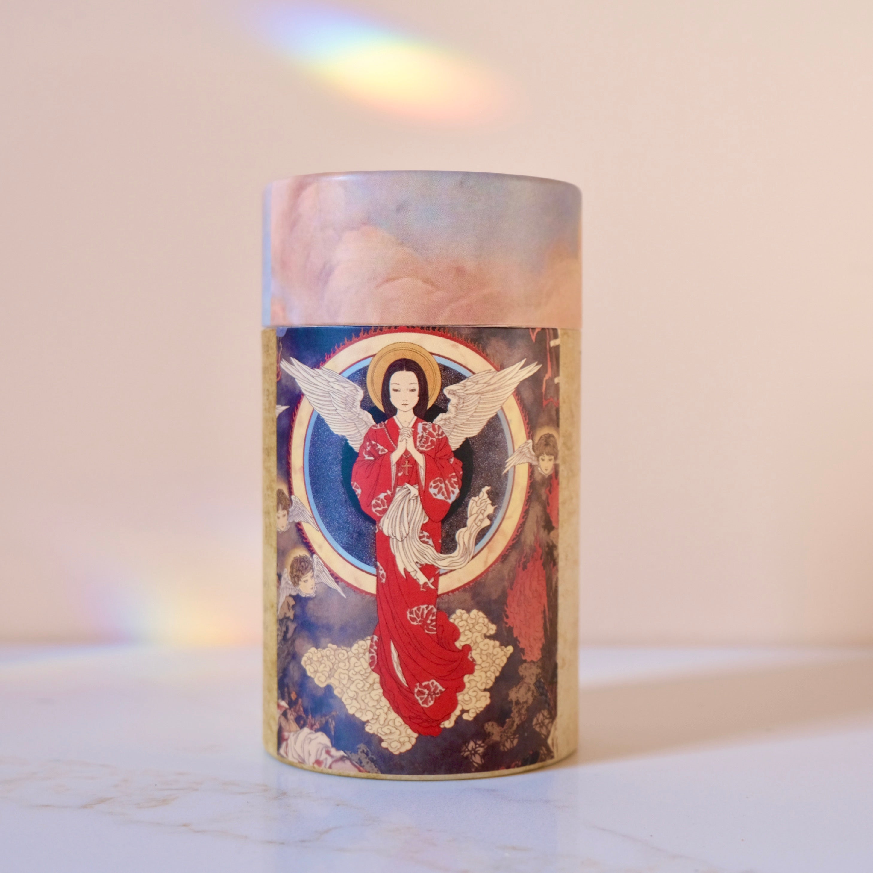 Decorative cylindrical product with artistic design on a light background