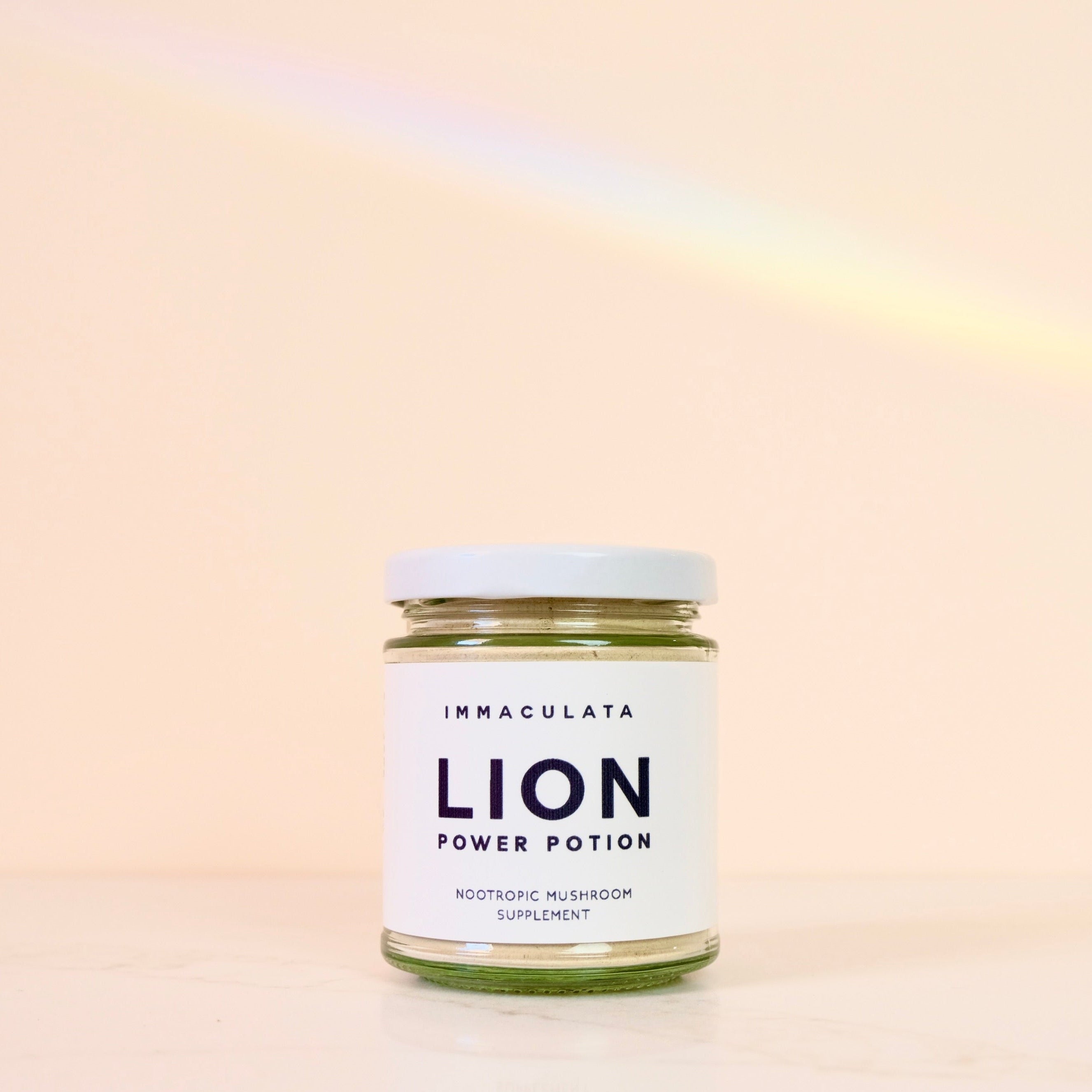 Jar labeled 'Lion Power Potion' by Immaculata on a gradient background