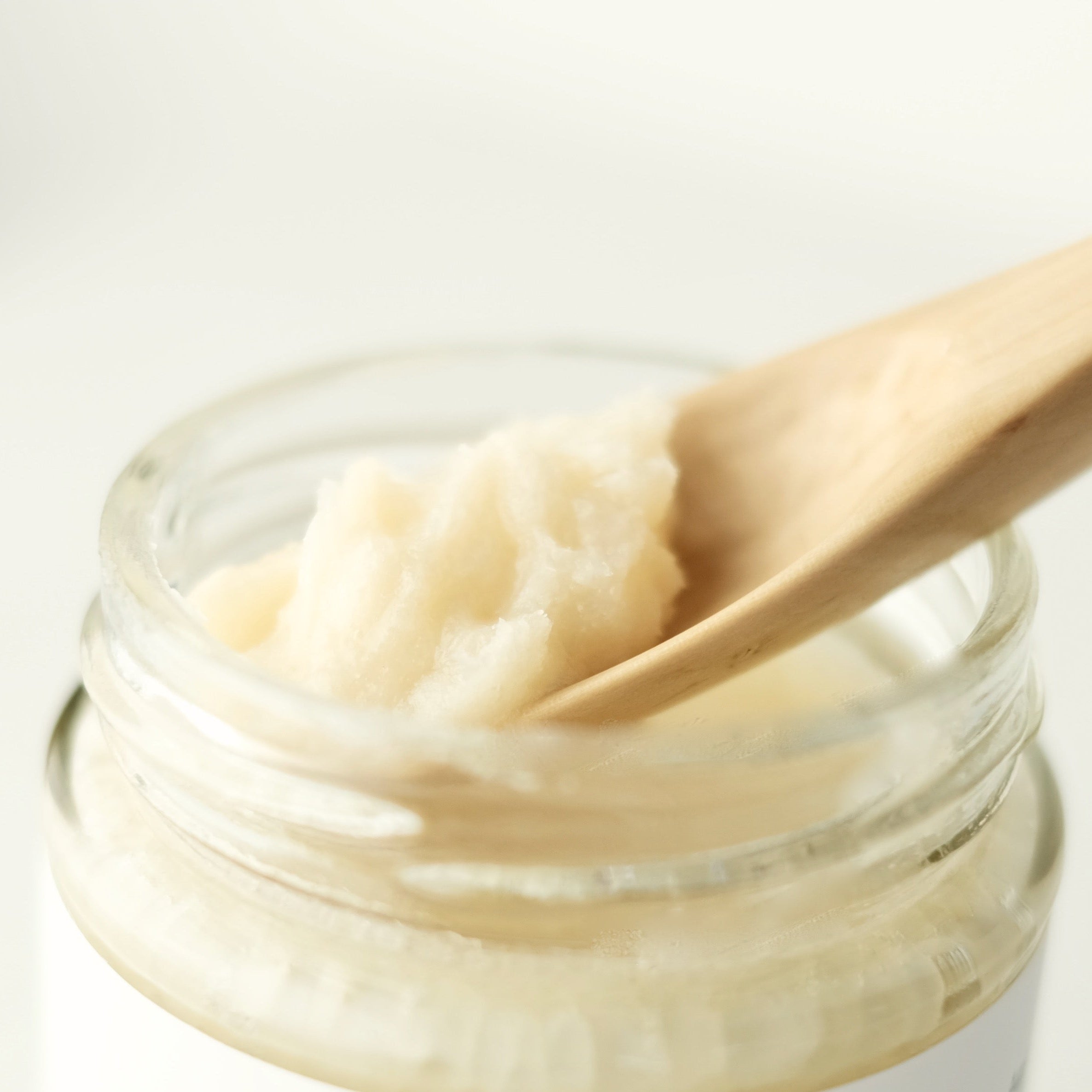 A jar of Skin Food, made of organic virgin coconut oil, raw cacao butter and unrefined, treatment-free beeswax. Formulated by Immaculata Herb Farm.