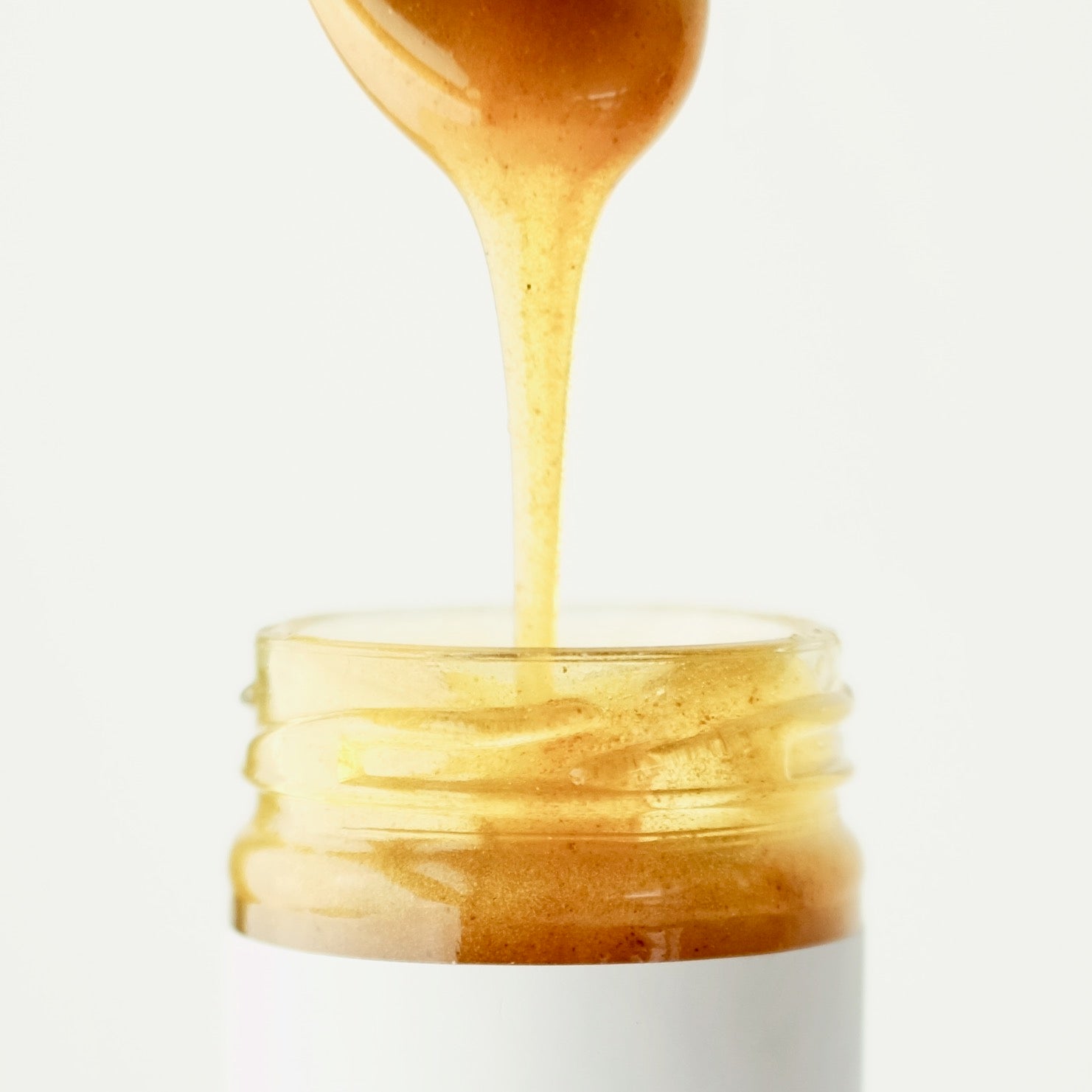 Close up of Immaculata Herb Farm Turmeric Honey Face Mask. Featuring raw honey and certified organic turmeric.