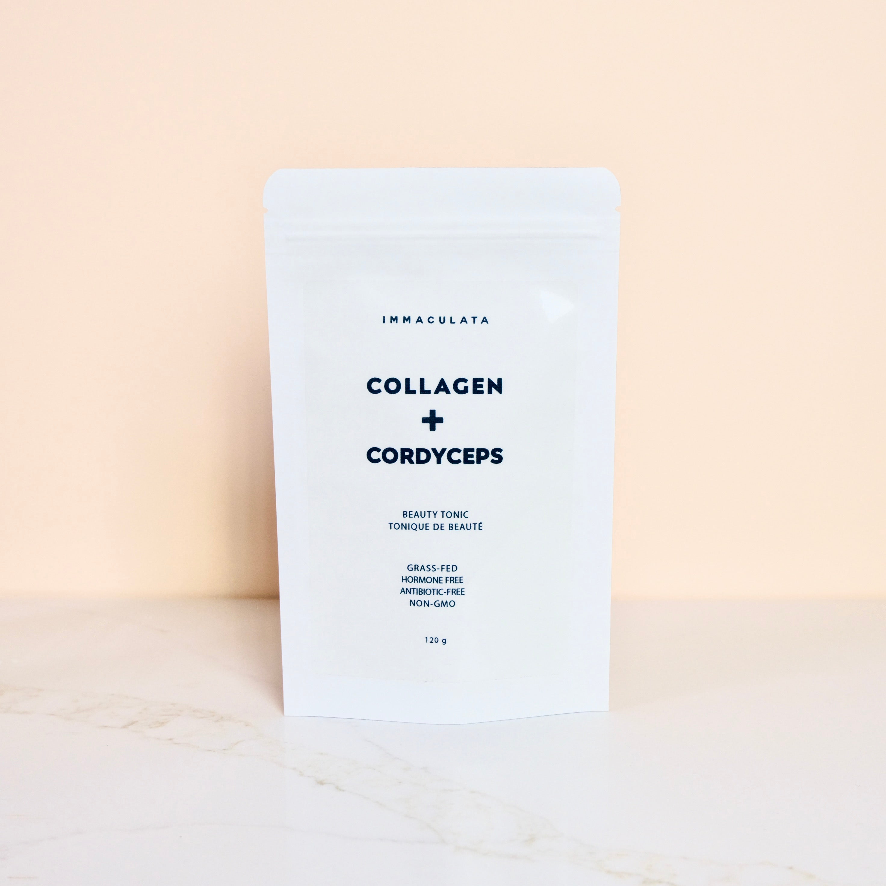Collagen + Cordyceps product packaging on a beige background
