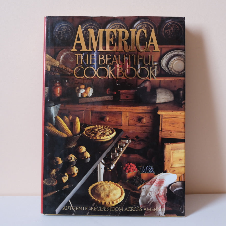America The Beautiful Cookbook: Authentic Recipes From the United States of America by Phillip S. Schulz (1990)