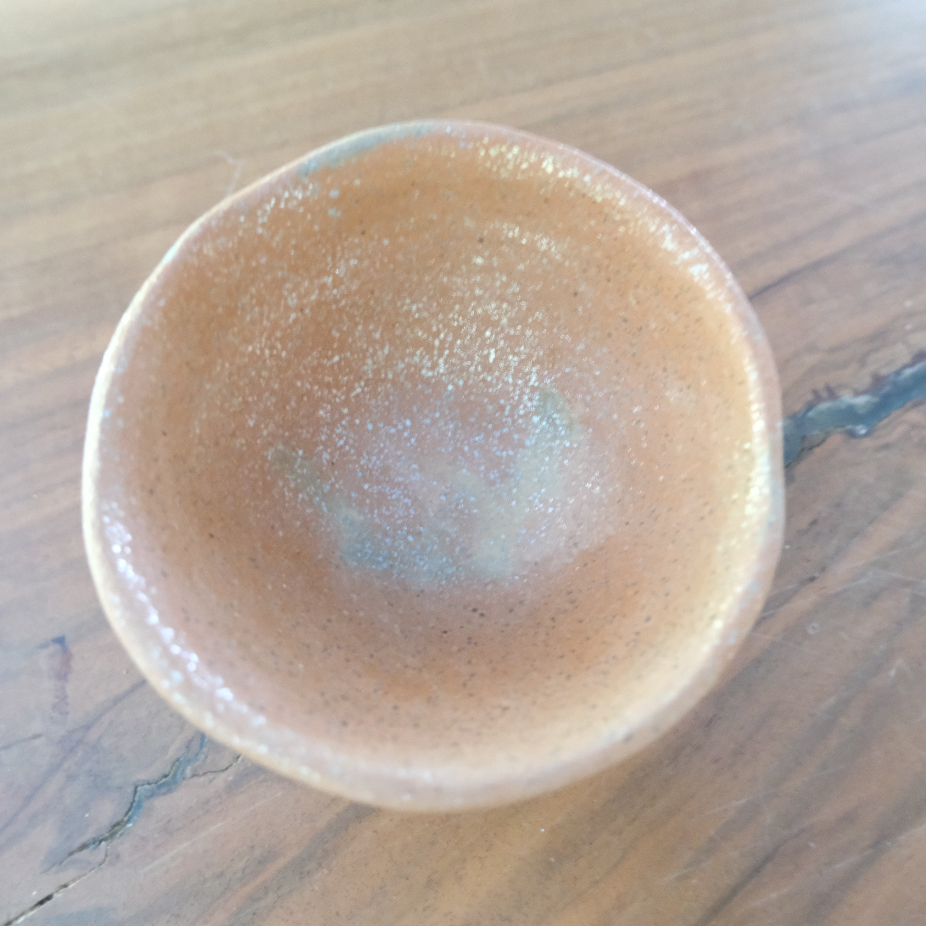 Micaceous clay earthenware tea bowl by The New New Age