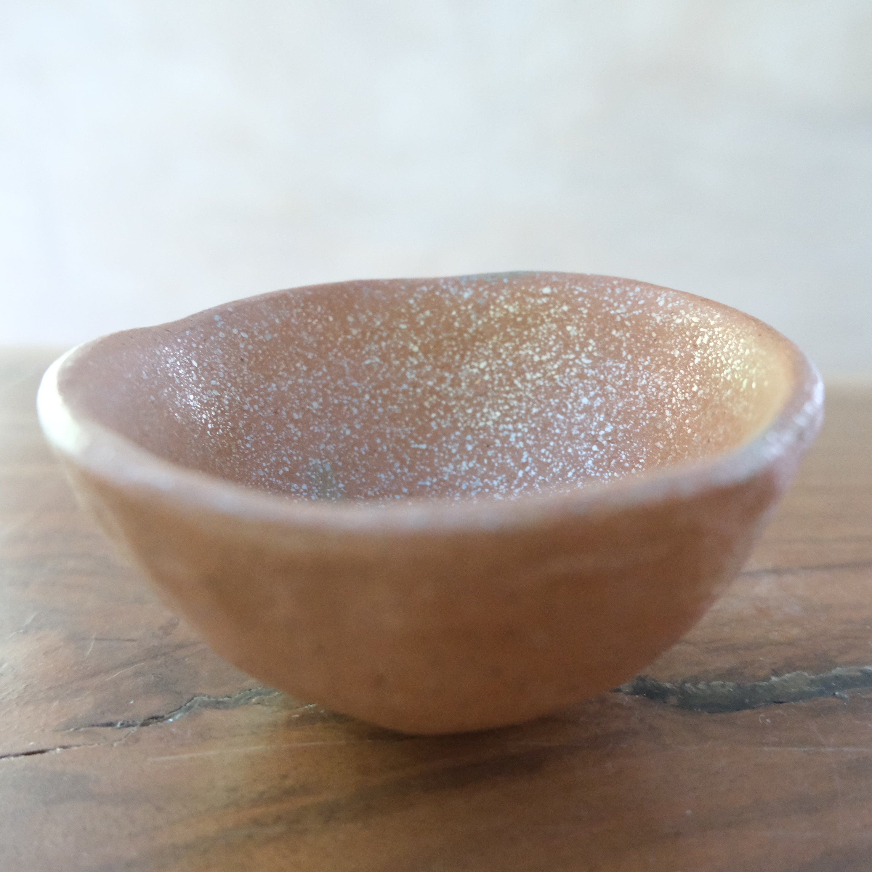 Micaceous clay earthenware tea bowl by The New New Age